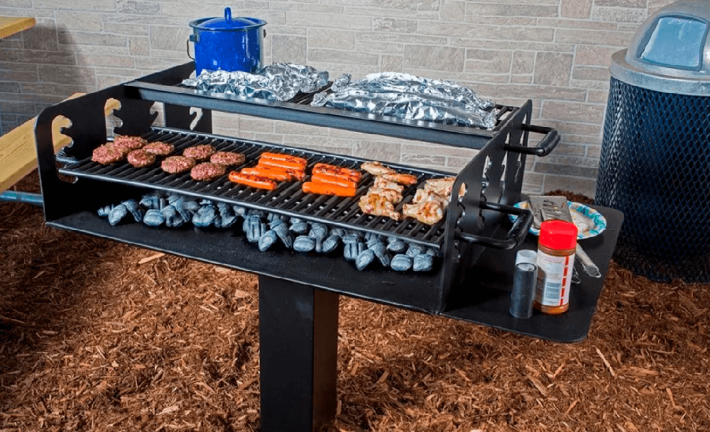 Commercial park grill with dual cooking grates providing expanded grilling surface for high-capacity cooking in parks and group gathering spaces
